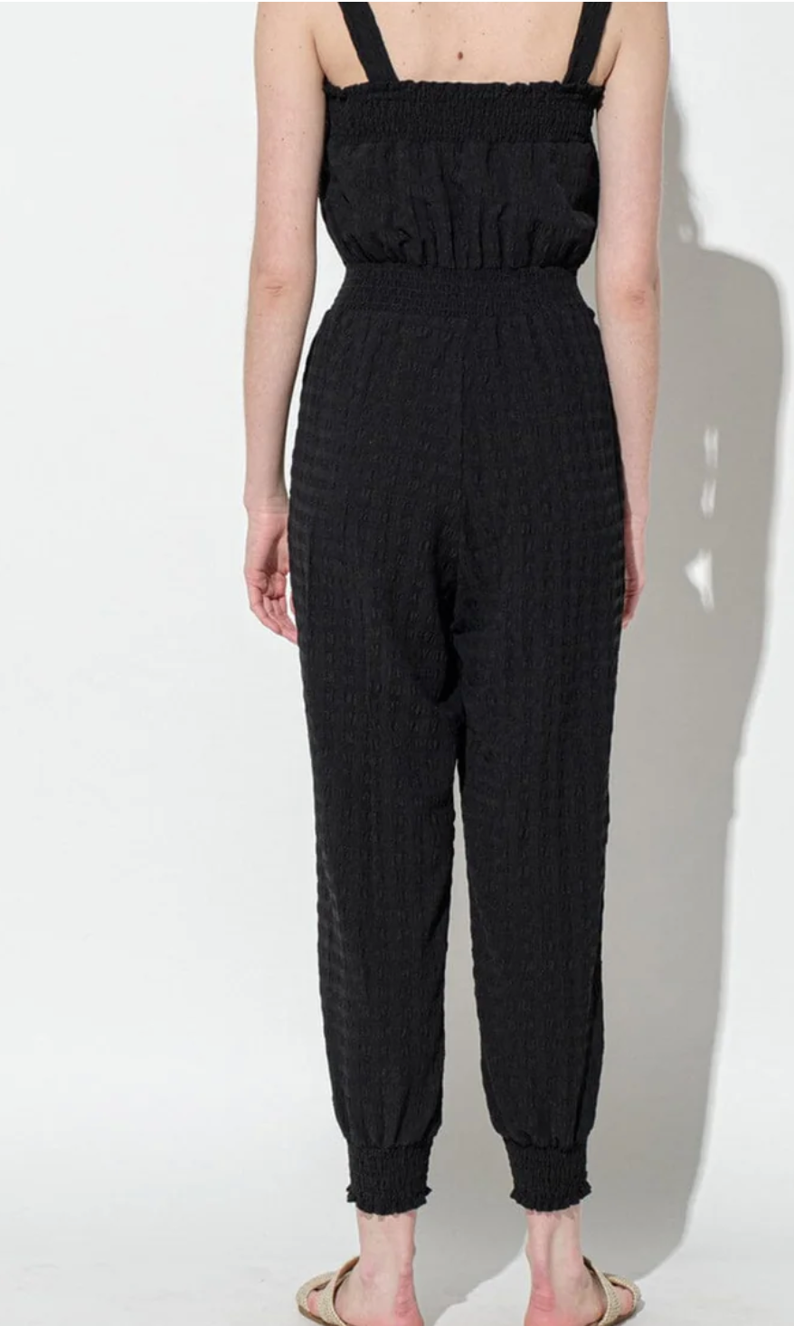 Chic Charm: Women's Sleeveless Smock Waist Jumpsuit With Pockets