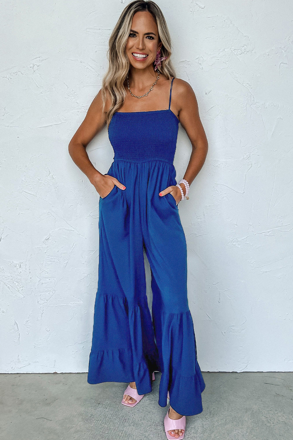 Chic Elegance: Navy Blue Spaghetti Straps Jumpsuit with Ruffled Details